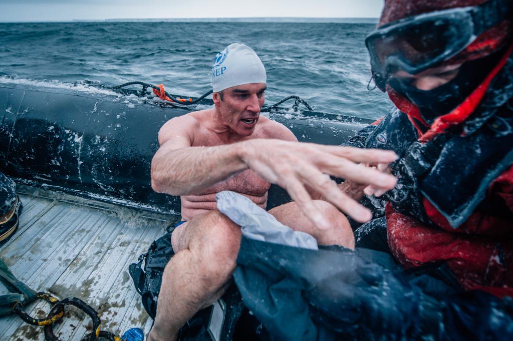 kelvintrautman's tweet photo. Sea spray was turning to ice in mid air. I've never photographed in such extreme conditions. #5Swims http://t.co/YLb6fBtTmg