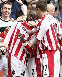 thinktoscore's tweet photo. #Think Blades! @STKabba was the match-winner against rivals Leeds Utd in the 2003 FA Cup Quarters. #SUFC #Lanelegend http://t.co/W4aY2pIIoU