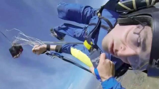 WRAL's tweet photo. CAUGHT ON CAMERA: Skydiver has seizure. Watch as instructor swoops in &amp; saves his life: http://t.co/x7dUqF9Min http://t.co/r2cnCNwRo6