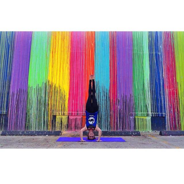 BlackSwanYoga's tweet photo. This wall looks like melting crayons. I love it! 💛💙💜💚 #blackswanyoga #poseoftheweek #headstand #bsyhouston #onliney… http://t.co/1kCRVrqMn9