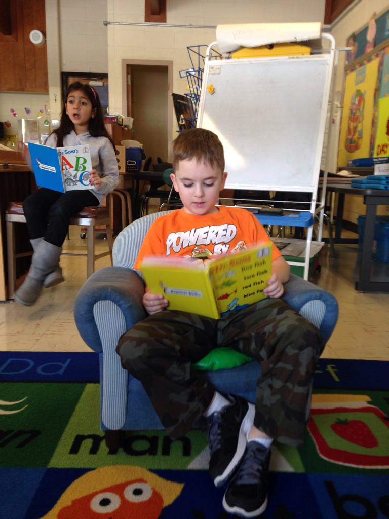 MrsSherlockj's tweet photo. My first graders were busy little readers today!  Happy Birthday Dr. Seuss! @Hwood_Pride http://t.co/UUH1cqy4L1