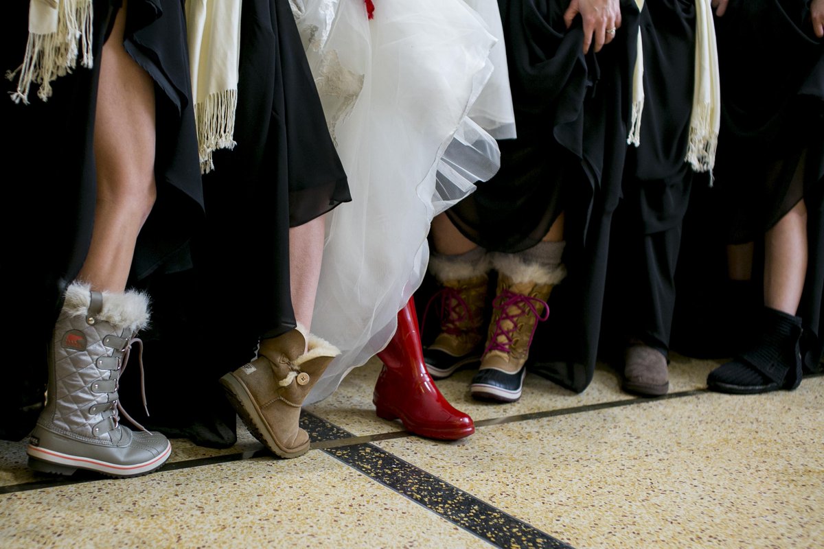 We hope you're staying warm this morning and are prepared for the snowy weather like this bride! #ShoesdayTuesday