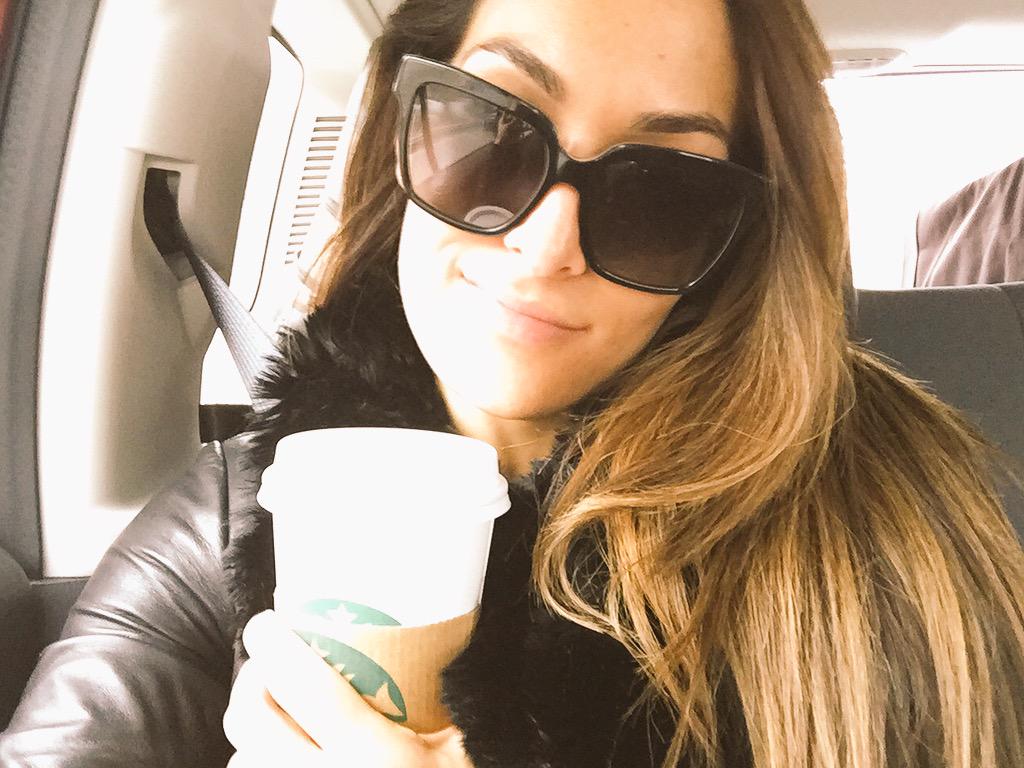 NikkiAndBrie's tweet photo. Coffee just tastes better as the Champ 
😊☕️💋 @Starbucks #WWEDC #SmackDown #FearlessNikki http://t.co/4RhVV7hMeS