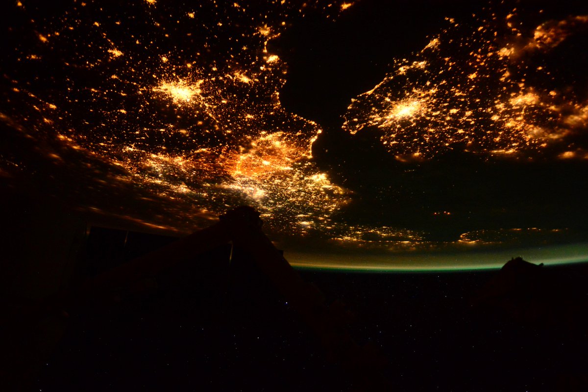 AstroSamantha's tweet image. Glittering lights on this clear January night on both sides of the English Channel.
