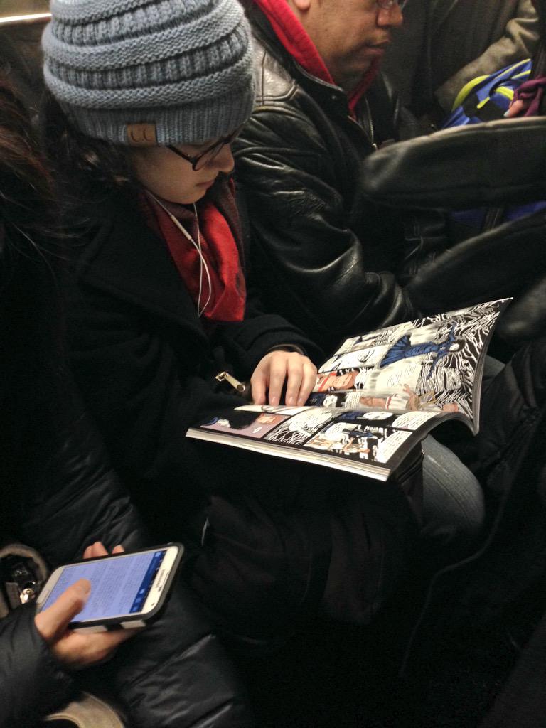 CurlsAndSports's tweet image. Lady on the train reading comic books. #embracethegeek 😁