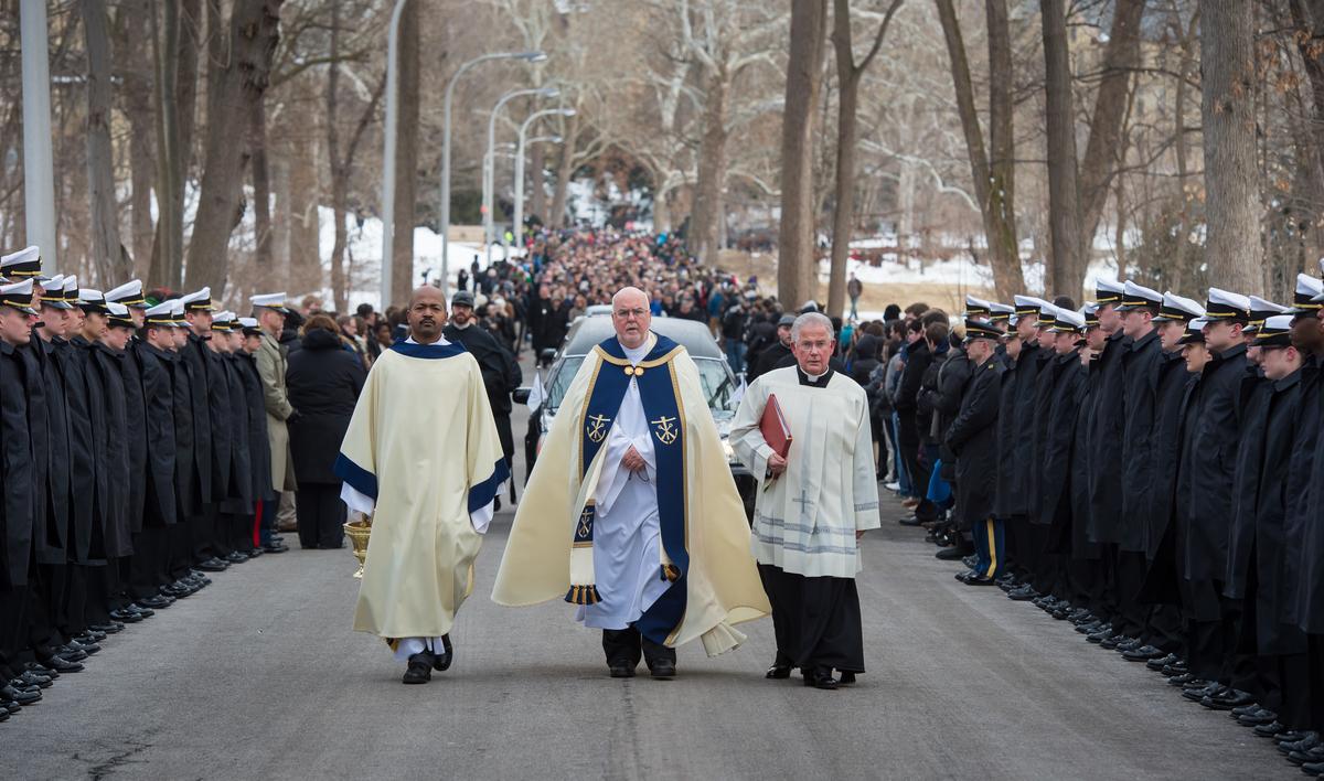 NotreDame's tweet photo. .@PhotosND captured a breathtaking photo during Fr. Hesburgh's procession to the Holy Cross Community Cemetary http://t.co/FCmEEPoHY0