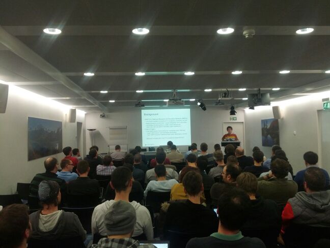 seanrmurphy's tweet image. Simon from @switch_CH blinding us with science (and his T-shirt) at #openstackch