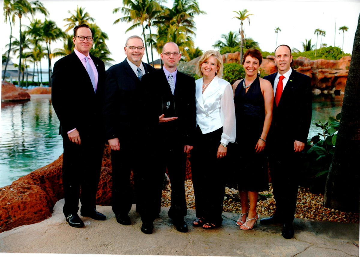 CISWestBend's tweet photo. Our General Manager Guy, Sales Manager Cathy, and Director of Operations Deb, accepting our Presidents Award. http://t.co/Dfo8kxpE5L