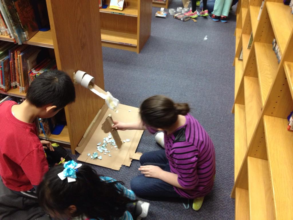 WyattLibrary's tweet photo. Fourth Grade making a (marble run) training course for our superhero. #EngineeringWeek2015 http://t.co/6YnW76Hk2y
