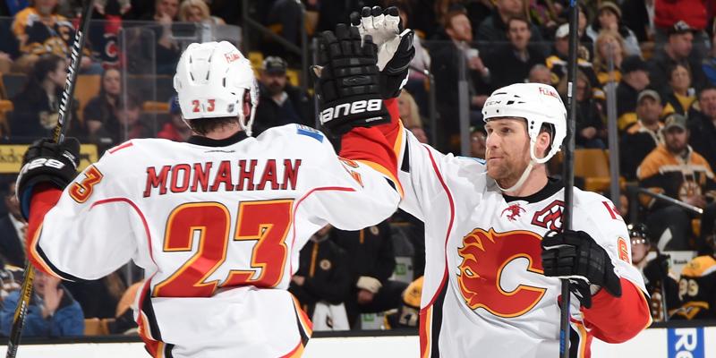 NHLFlames's tweet photo. #FLAMES WIN! Schlemko wins it for Calgary in his first game with the Flames! #CGYvsBOS #HighFive http://t.co/FdqYprKx2P
