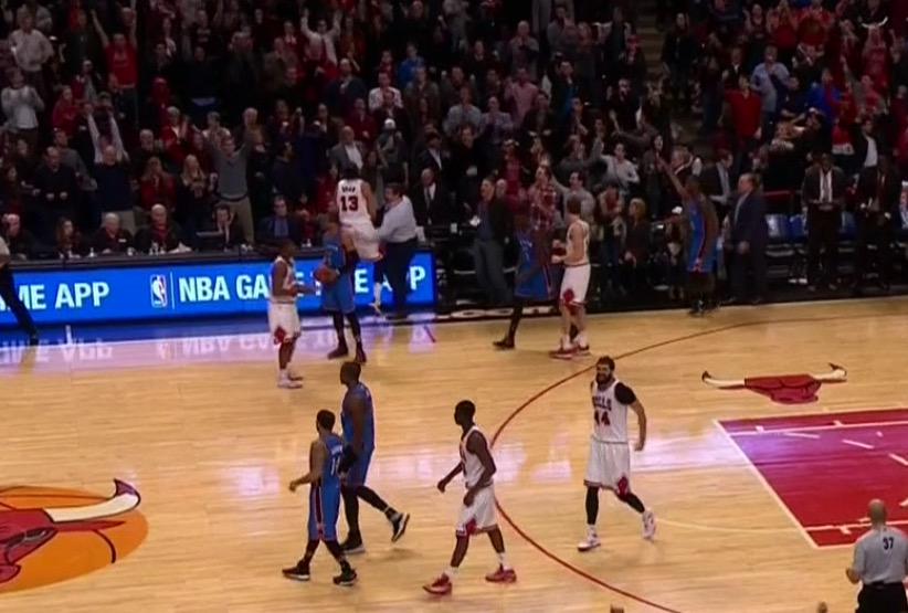 BleacherReport's tweet photo. VIDEO: Bulls fan sitting court side celebrates by slapping Joakim Noah on the rear. http://t.co/sgDKRdhqVV http://t.co/3Av7Dpklyv
