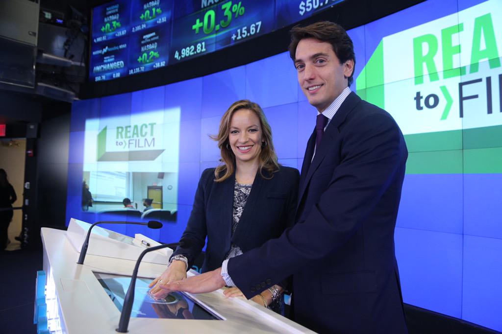 NasdaqExchange's tweet photo. .@REACTtoFILM rings the @Nasdaq Opening Bell! #reacttofilm @coraliecharriol http://t.co/opTxqi0B1T