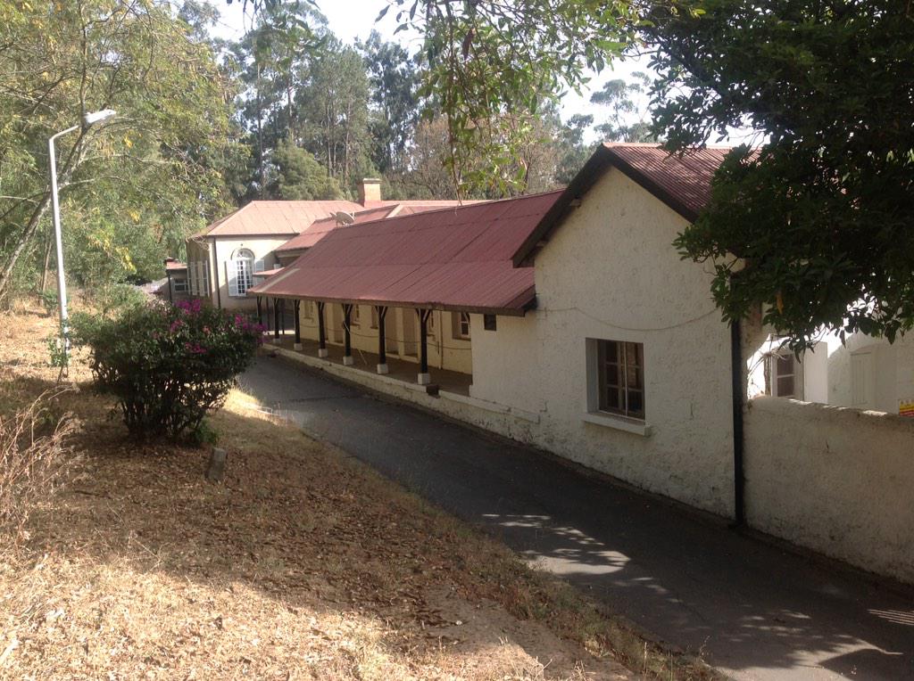 GregDoreyIT's tweet photo. Offices and storerooms at the #BritishEmbassyAddis today and how they appeared as stables in 1921. @UKinEthiopia http://t.co/fiCYGao9dE