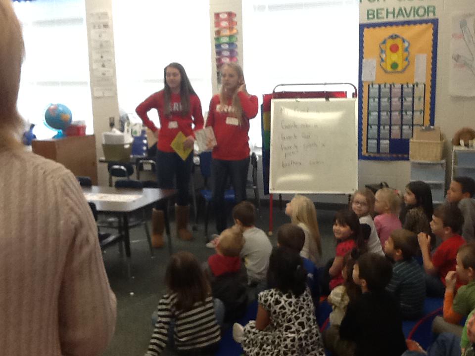 Merenda_Brady's tweet photo. The @ERHS_Mustangs come and read to Morgan Elementary @RSSS_MESMedia for Read Across America! #Morganalumni http://t.co/VjTPIOduXs
