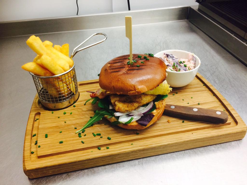 our new southern fried chicken burger topped with bacon, cheese and a smoky BBQ Mayo served on a brioche burger bun.