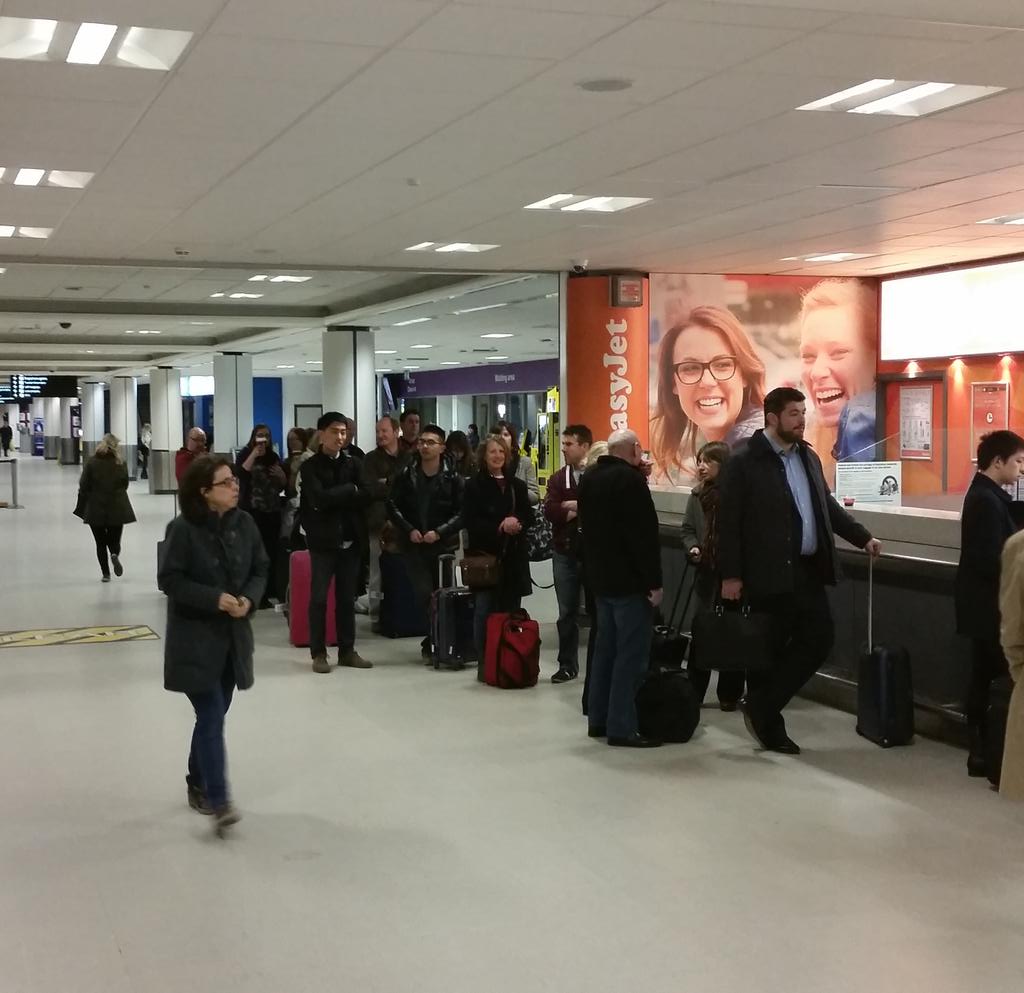 JBB69's tweet photo. @flybe you mean the staff that can't talk because they are dealing with this lot?? http://t.co/fFsNJogAup