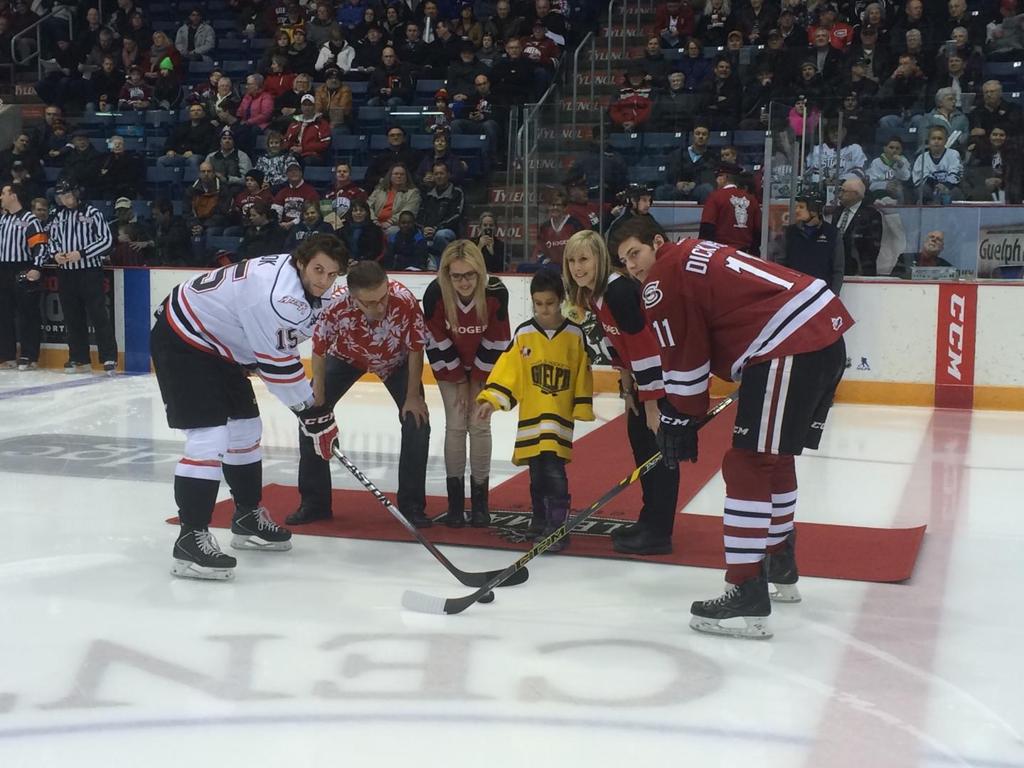 Storm_City's tweet photo. Lookin' good in this ceremonial puck drop, @jdickinson_11. Tonight's game is presented by @rogers! #CaptainDicky http://t.co/ES23dK8GPG