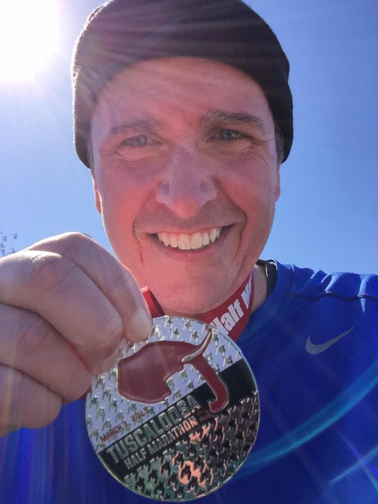 alt1017's tweet photo. Our own @GregThomasDJ flashing the #Tuscaloosa #HalfMarathon finishers medal. #RollTide #thm15 #race http://t.co/wfGuGgsIv1