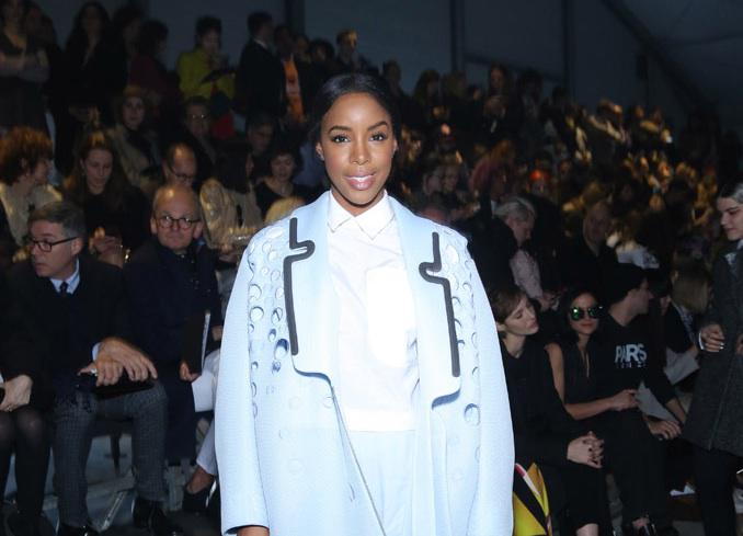 wwd's tweet photo. .@KELLYROWLAND has been finding inspiration for her next album at #PFW: http://t.co/uRFH53dG7G #WWDFrontRow http://t.co/GzFDQNFDlW
