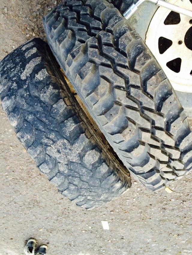 Greenlaner91's tweet image. Need some new shoes for the #jimjam My spare next to one of my tyres that died today! #puncture #mudpluggers