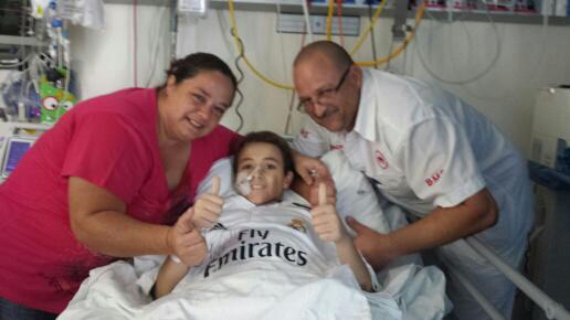 Radio702's tweet photo. Here is a picture of Keagan and his family receiving gifts from @Cristiano via @ReachForADream #Ronaldo http://t.co/V6bzLGVY6A
