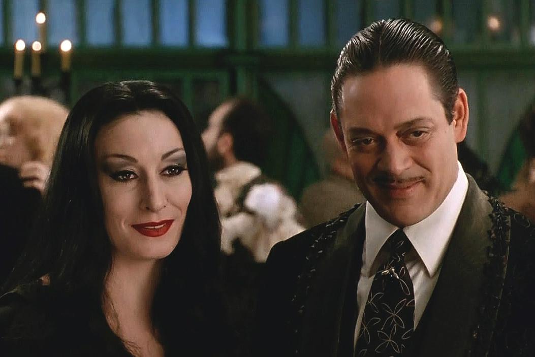 Happy birthday, Raul Julia! (Mar 9, 1940 - Oct 24, 1994)
As Gomez with Morticia in \The Addams Family\ movie (1991). 