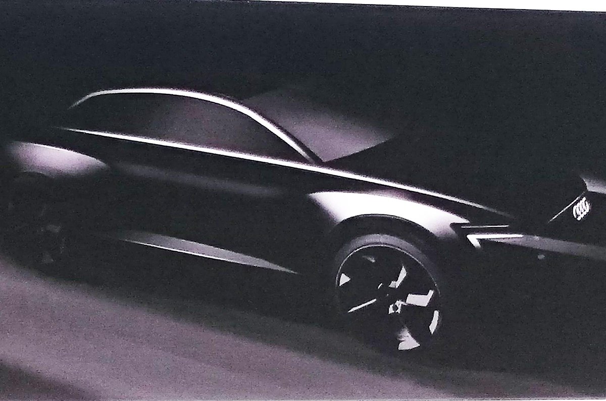 autocar's tweet image. We've seen a sneak preview of a new all-electric Audi SUV bit.ly/1CZDEUS