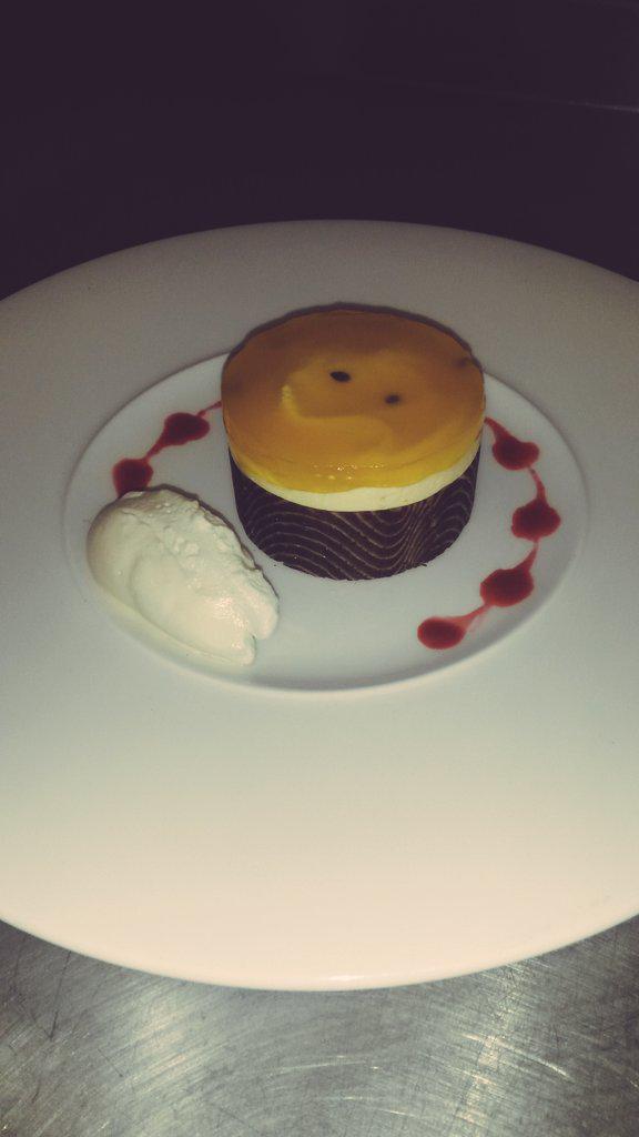 SweetTreatsSita's tweet photo. Passion Fruit Delice with Raspberry Coulis and A Rocher Of Cream #patisserie #passionfruit #jaconde http://t.co/HdMz78opfN
