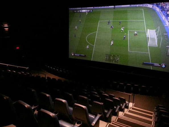 CauseWereGuys's tweet photo. Someone's girlfriend rented out a movie theatre for his birthday so he could play FIFA like a king... http://t.co/5OXioAi8gR