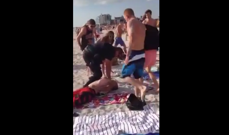 Playboy's tweet photo. Watch this badass cop chokeslam two trouble-making bros on spring break - http://t.co/XDUufiugA9 http://t.co/L5IN8OKtRm