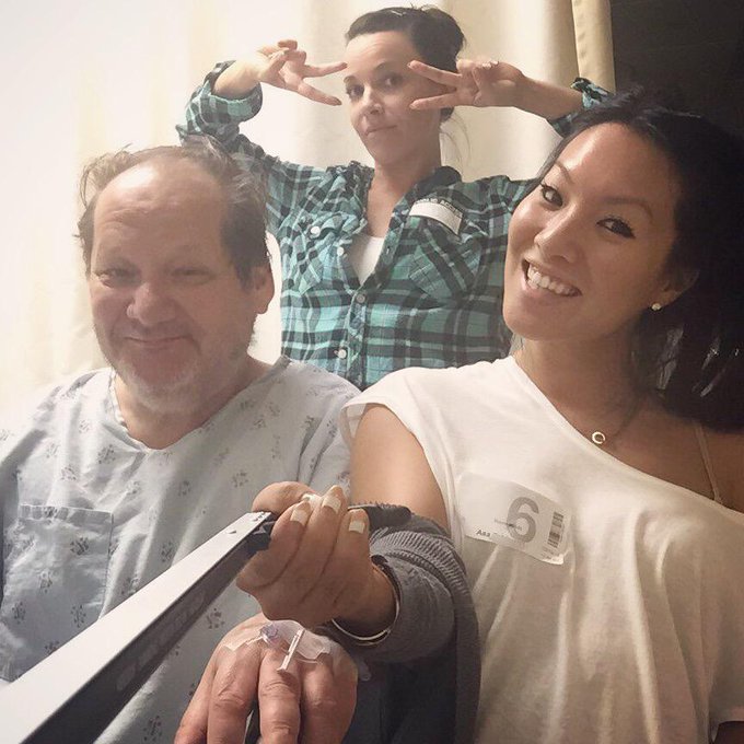 Using Spiegler's medical reacher-grabber (that's what it's called, we googled it) as a selfie stick w/