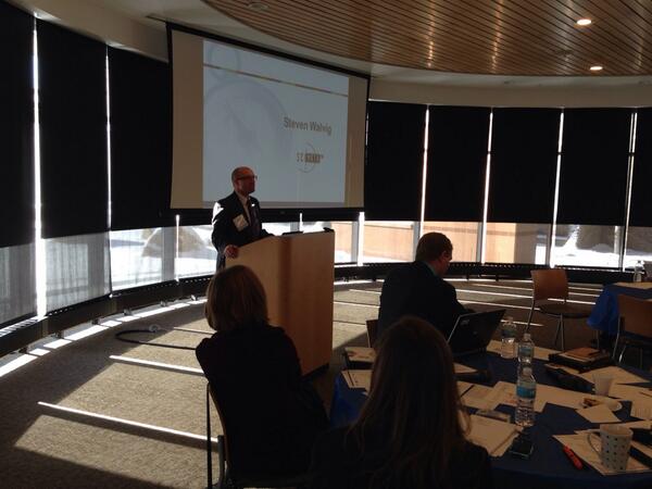 Plindstrom's tweet image. SciMathMN Board Chair Steve Walvig leading shareholder stories at #CompassSTEM event.