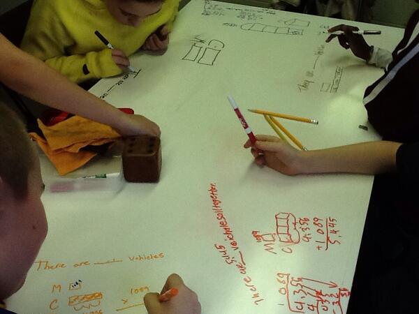 JKoestler2's tweet image. Enfield students solve problems with bar models on (homemade) whiteboard table. @IthacaNYSchools #icsdplc