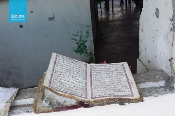UWT_UK's tweet photo. The Masjid was burnt but the Qur'an remains. (Zamboanga, #Philippines) http://t.co/Ya2jXDgfVc