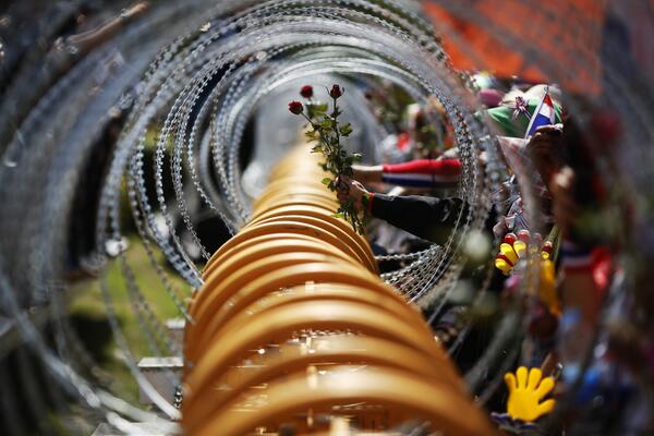 Beautiful photograph of an ugly protest, by Damir Sagolj at the Defense Ministry in Bangkok today