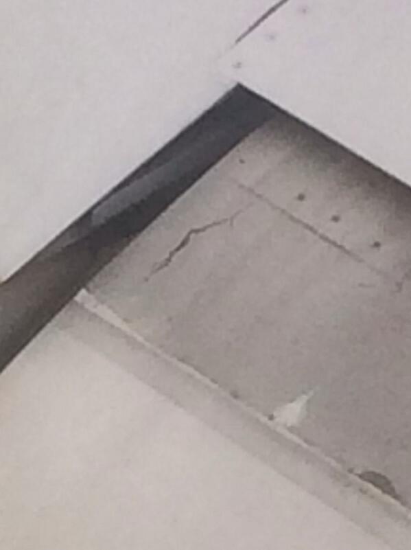 Callumundo's tweet image. @Ryanair so yeah. The plane im on has a crack in the flap!! #FixPlease #StationaryBTW