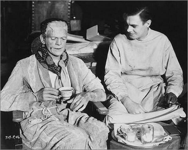 HistoryInPics's tweet photo. Boris Karloff (the Monster) and Colin Clive (Frankenstein) having tea on the set of Frankenstein http://t.co/TkJJKMfzdk