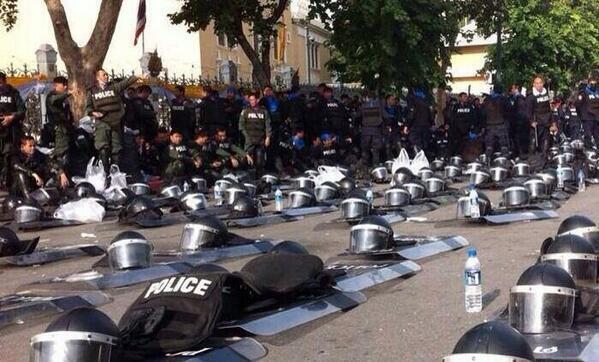 police lay down their gear