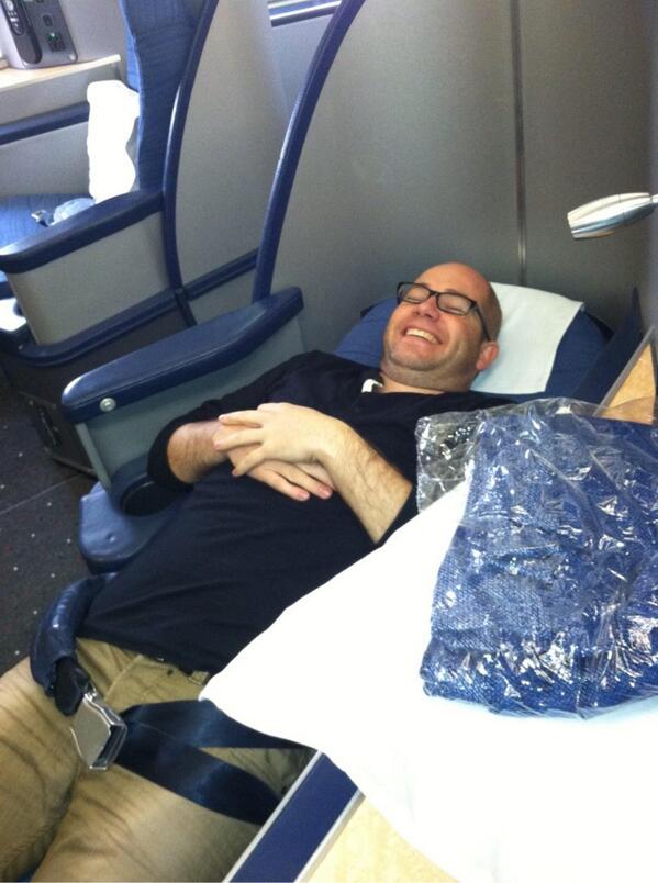 TajsArmy's tweet photo. Flying to cancun, lying down!! #churning rules. http://t.co/afWus4pdji