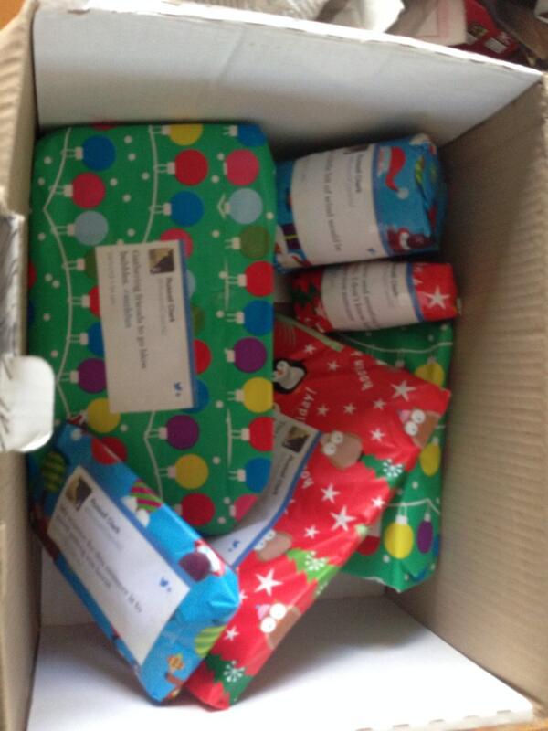 RussellClarkNZ's tweet photo. MY #nzsecretsanta ARRIVED and they got me ALL THE THINGS! With my tweets pasted to each gift. Thank you so much! http://t.co/3bDQBecnyt