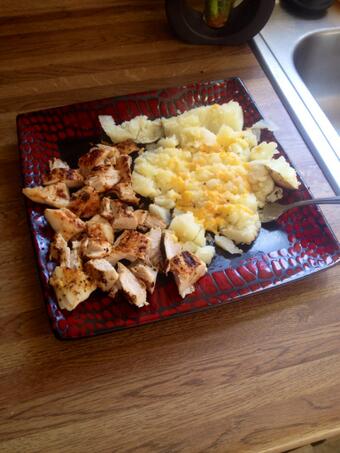 What I pretty much live off of. Baked potato and chicken. Putting my plates to use @Pa_Guy69 :) haha