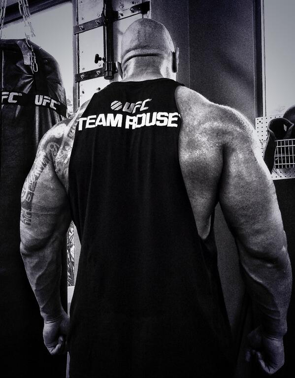 TheRock's tweet photo. Be relentless...then clean up your sweat. #TeamRousey #TeamBringIt http://t.co/TMtf9vUM69