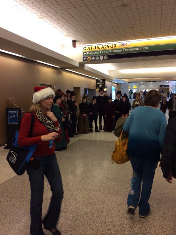 jackfields123's tweet image. Who let these Christmas Carolers into the Houston airport? Get me back to NC please