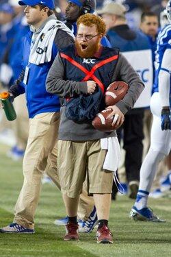 YahooSports's tweet photo. FSU's ball boy is stealing America's attention. @Eric_Adelson introduces you to Red Lightning: http://t.co/sweoENqDyh http://t.co/G44NquPqVN