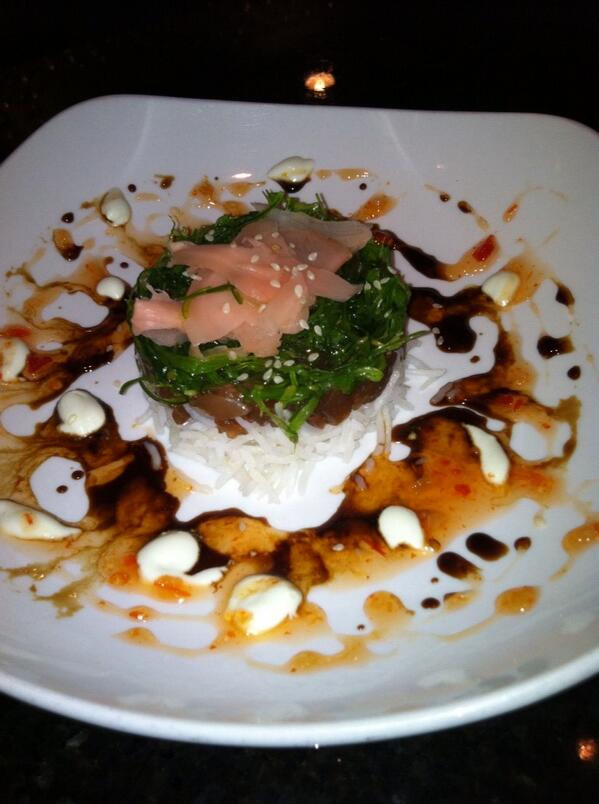 Ahi Tuna Tower. Coconut Jas rice, marinated ahi, sesame seaweed, pickled ginger w/ wasabi red chile soyglaze