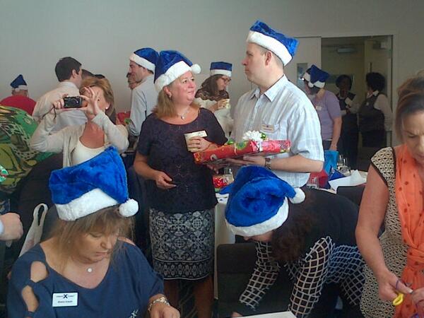 The Celebrity Cruises team @CelebrityUK at charity GIVE day in Miami wrapping presents for the kids
