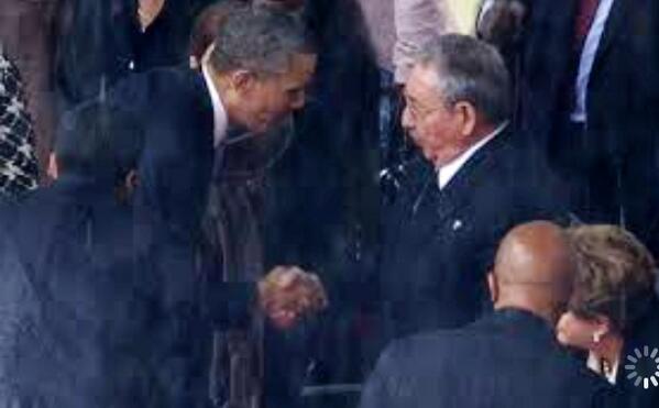 Only Madiba could have pulled this one off!
Obama shakes hands with Castro.