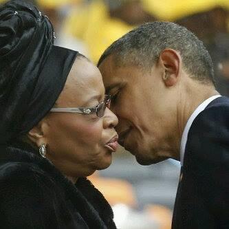 Obama awkward kiss for Nelson Mandela's widow Graca Machel