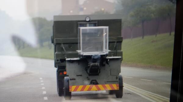 _bcroft's tweet image. #MandelaUnie military truck towing a canon with a clear perspex box attached seen driving past 1 Mil