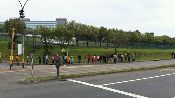 _bcroft's tweet image. #MandelaUnie people forming up along the road outside 1 military